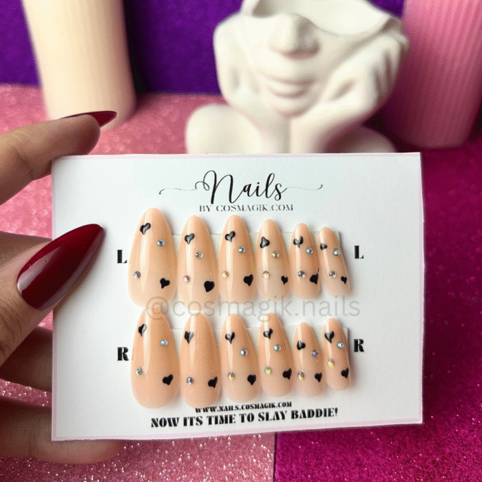 “Glimmer Heart black sparkly press-on nails with heart accents – reusable and beginner-friendly by Nails by Cosmagik in Pakistan”